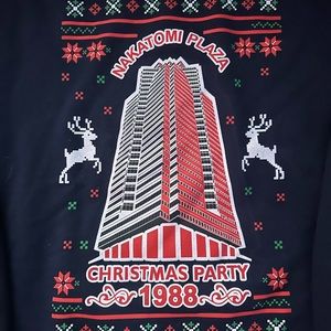 Golden “Nakatomi Plaza” size large Christmas Sweatshirt.